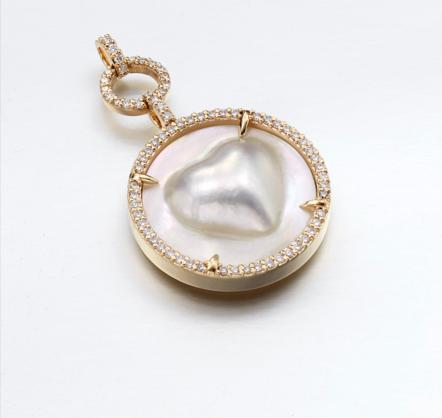 Three Tie mabe heart pendant