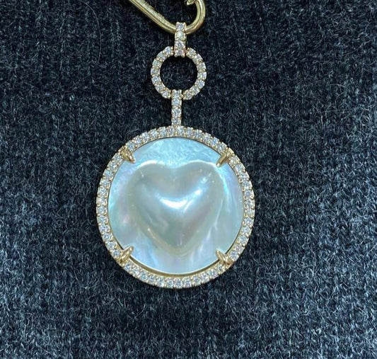 Three Tie mabe heart pendant